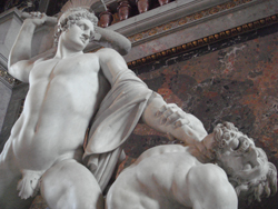 A statue by Canova on the stairs at the Art History Gallery in Vienna