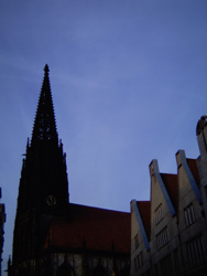 View of the spire of Church in the old town of Mümster