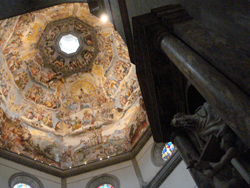 Statue and Cuppola of the Duomo in Florence, Italy