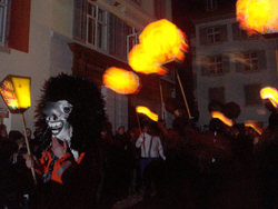 Chienbaesen Cortege processing through the Altstadt of Liestal before the bonfires