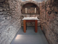 Altar at the tomb of Saint Maurice in the apse of the original church at The Abbey of Saint Maurice in Canton Valais, Switzerland
