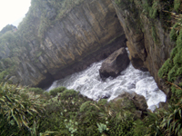 The Splurge Pool at the Pancake Rocks on the West Coast of South Island, New Zealand