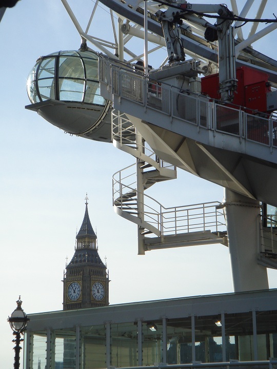 London - The London Eye in front of Big Ben