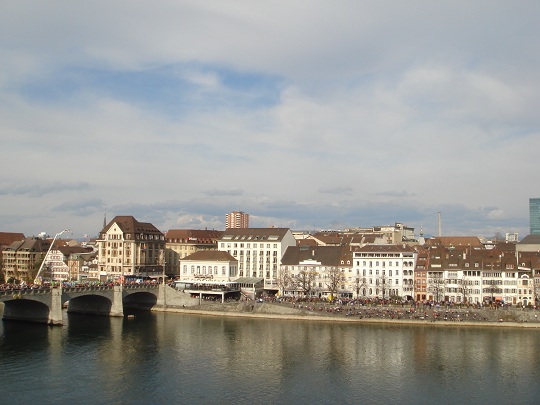 Basler Fasnacht - bridge and river watefront during the cortege at Fasnacht